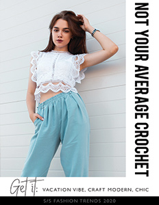Young fashionable woman wearing light blue pants and white crochet top